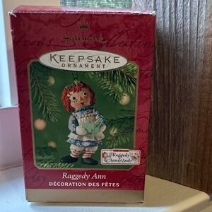 Hallmark Keepsake Ornament with (Small )Raggedy Ann in Blue and Red